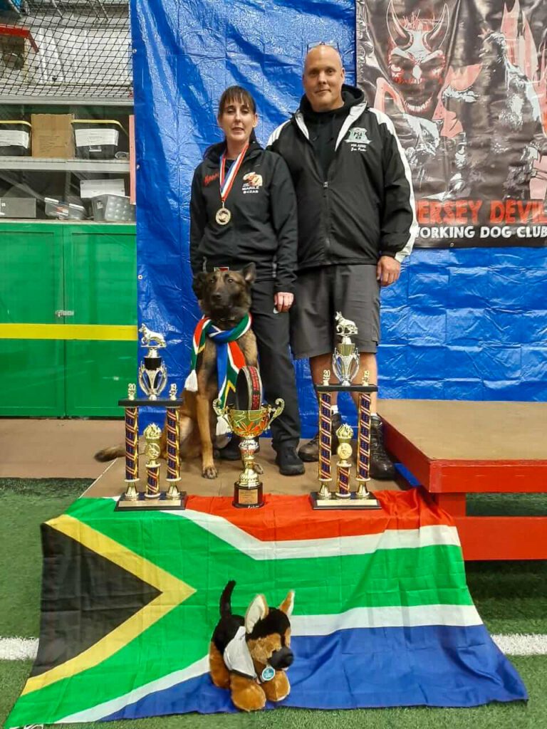 Marilé and Charles on the PSA podium with their trophies